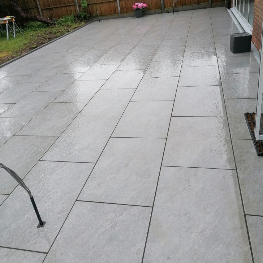 https://www.tilesandsmiles.co.uk/cdn/shop/files/FumeGrisOutdoorPorcelainPavingSlabs-900x600x20mmnewpr3.jpg?v=1722257928